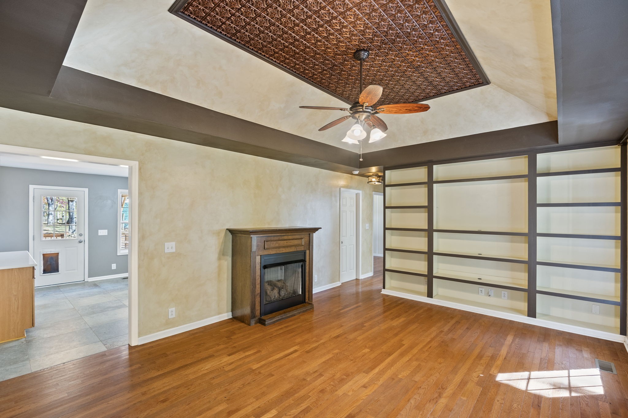 4985 Minnis Road Springfield, TN 37172 - Photo 40 of 58 wooden floor in an empty room with a fireplace