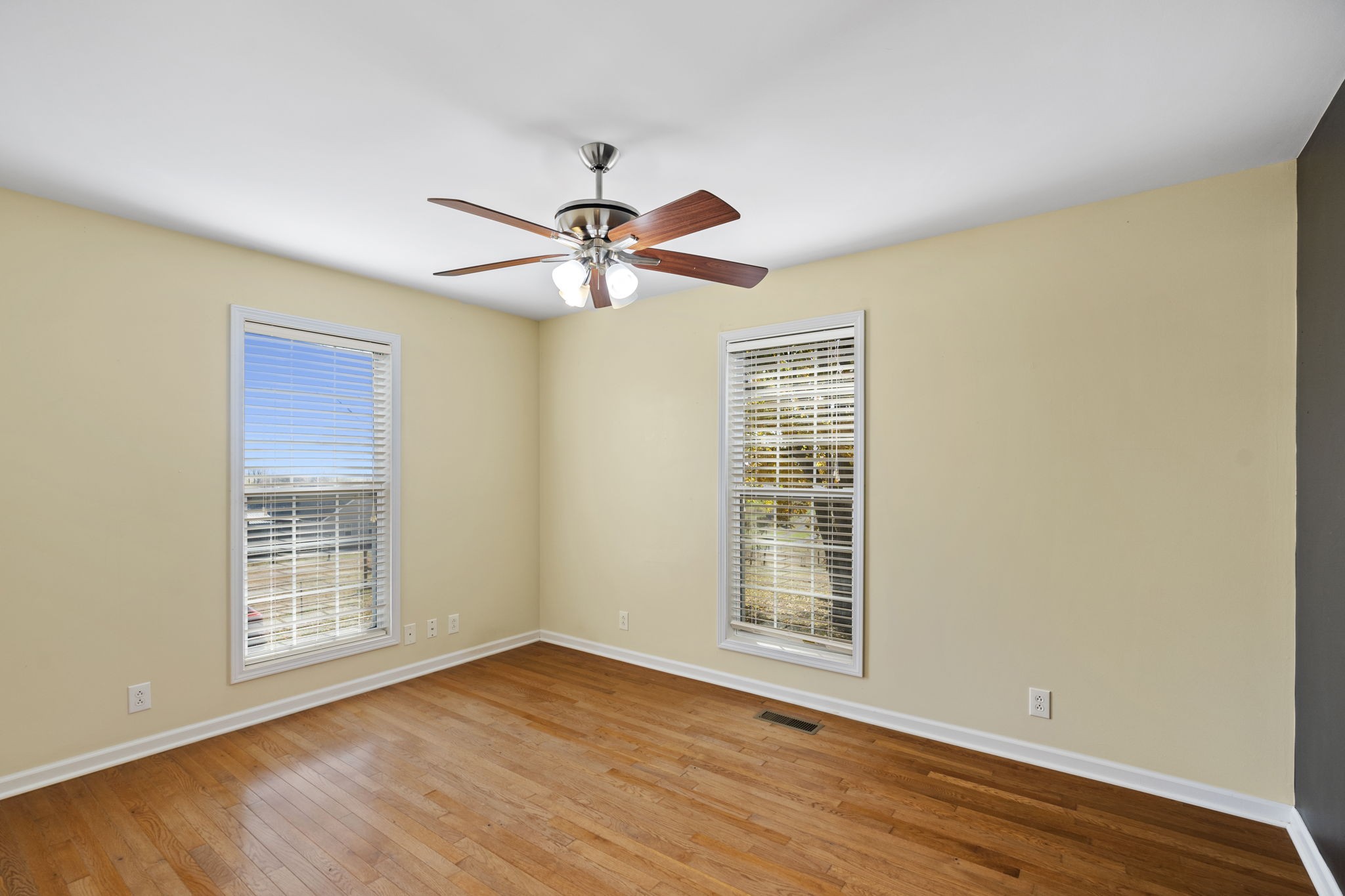4985 Minnis Road Springfield, TN 37172 - Photo 42 of 58 a view of an empty room with a window and wooden floor