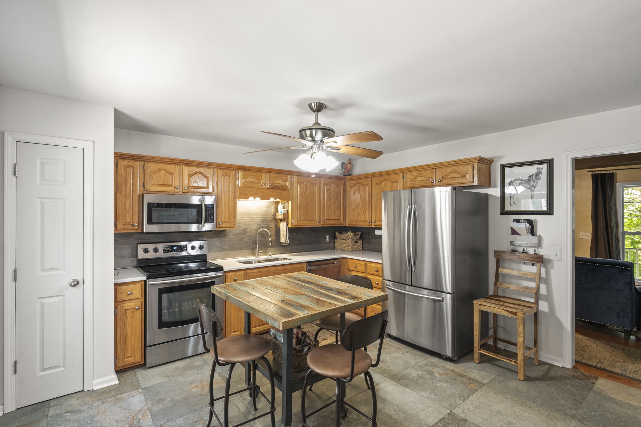 4985 Minnis Road Springfield, TN 37172 - Photo 6 of 58 a kitchen with refrigerator and stove