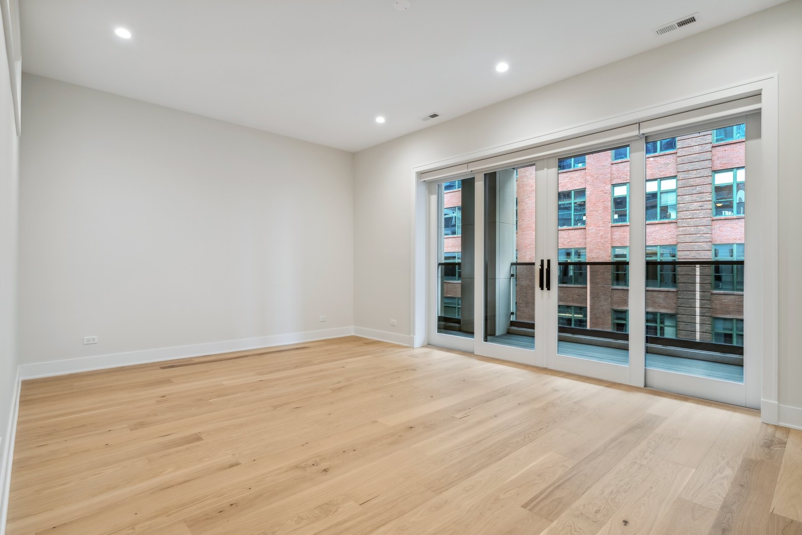 232 South Green Street, Unit 4S Chicago, IL 60607 - Photo 12 of 42 a view of an empty room with glass door