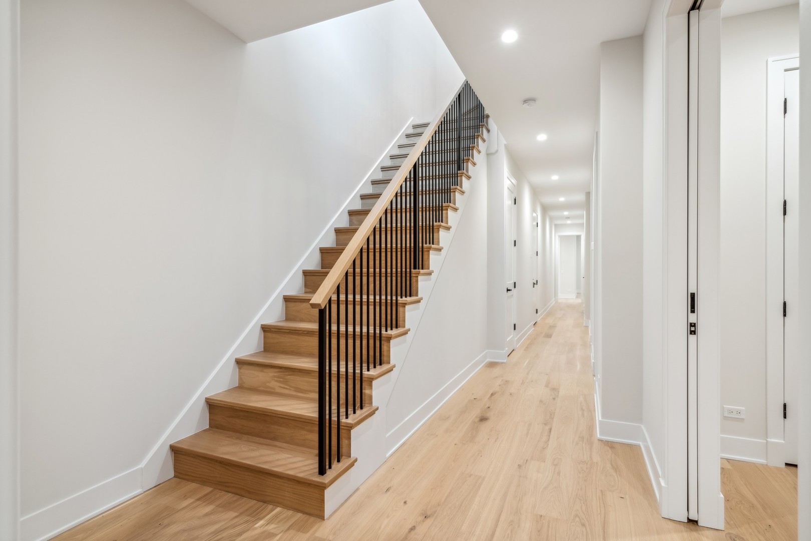 232 South Green Street, Unit 4S Chicago, IL 60607 - Photo 15 of 42 a view of entryway with wooden floor