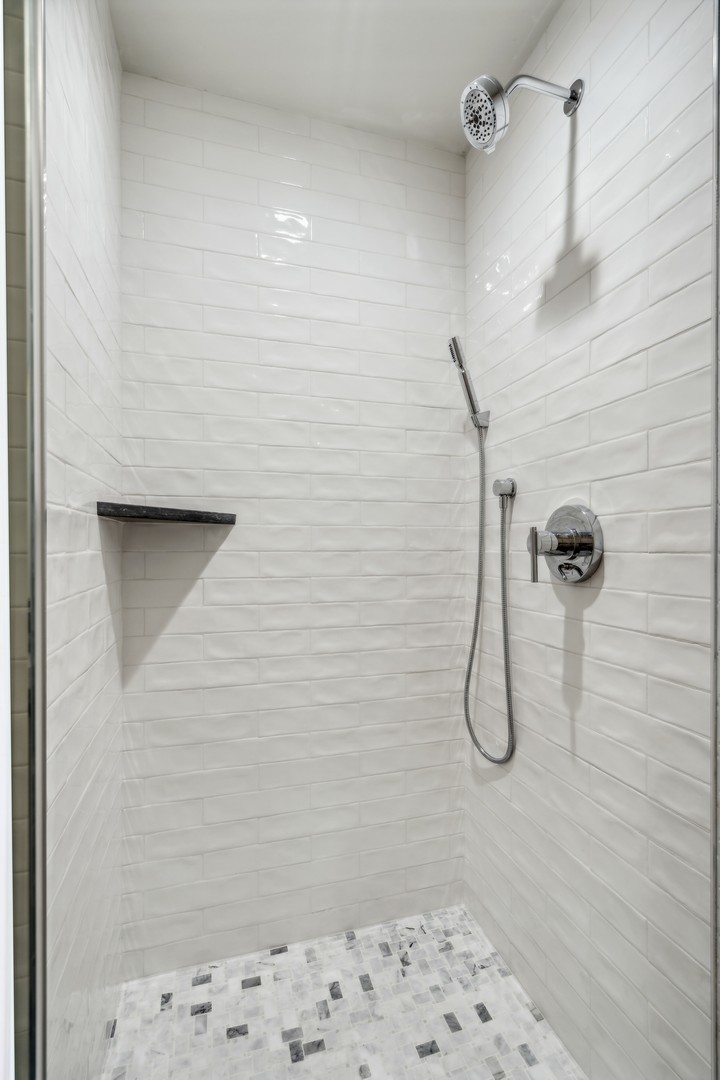 232 South Green Street, Unit 4S Chicago, IL 60607 - Photo 28 of 42 a bathroom with a shower