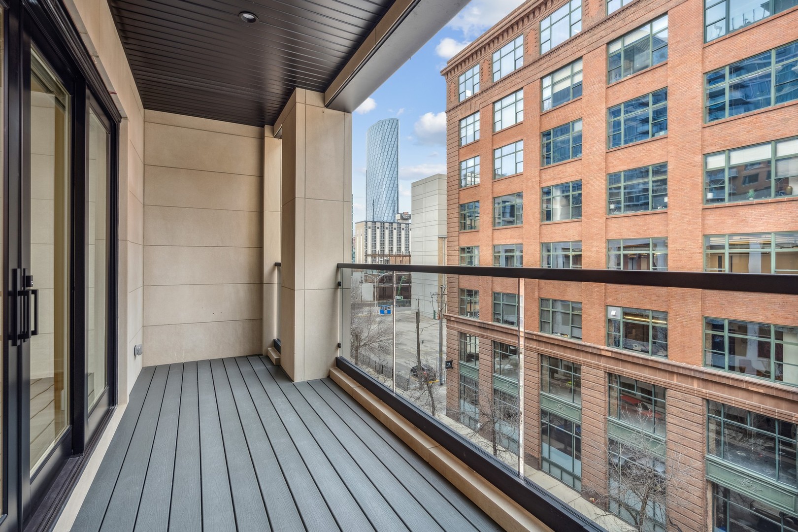 232 South Green Street, Unit 4S Chicago, IL 60607 - Photo 38 of 42 a view of balcony with wooden floor