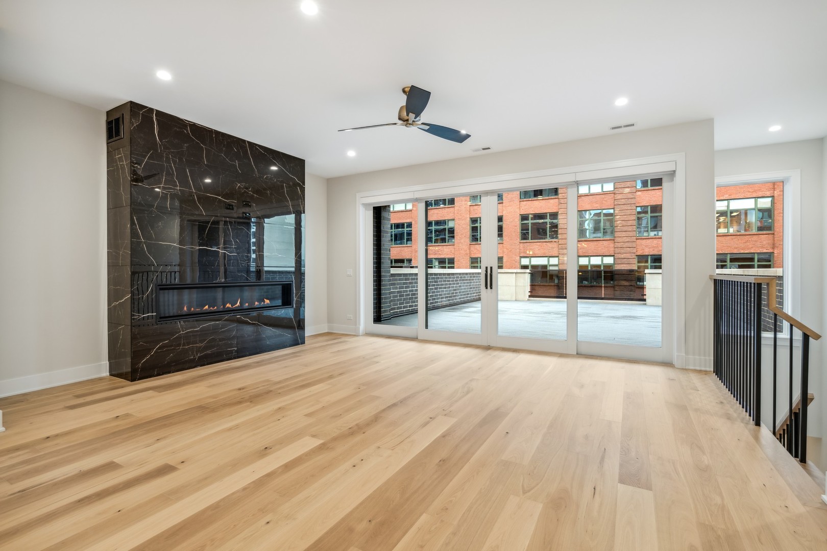 232 South Green Street, Unit 4S Chicago, IL 60607 - Photo 7 of 42 a view of empty room with wooden floor and floor to ceiling window
