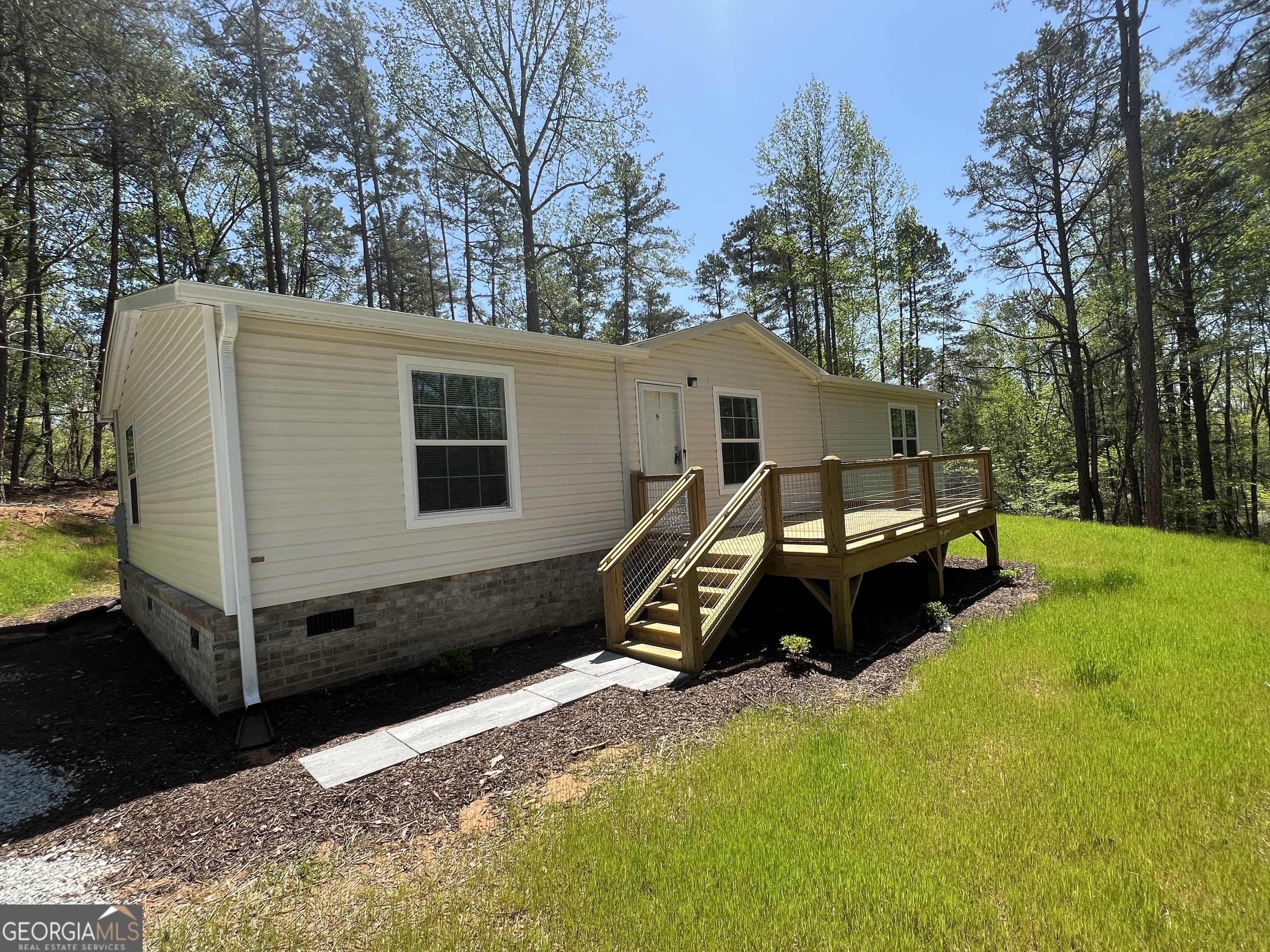 69 Cheyenne Trail Martin, GA 30557 - Photo 11 of 63 a view of a house with a backyard and trees