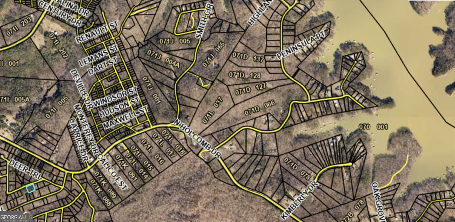 69 Cheyenne Trail Martin, GA 30557 - Photo 15 of 63 a sign on a street next to a building