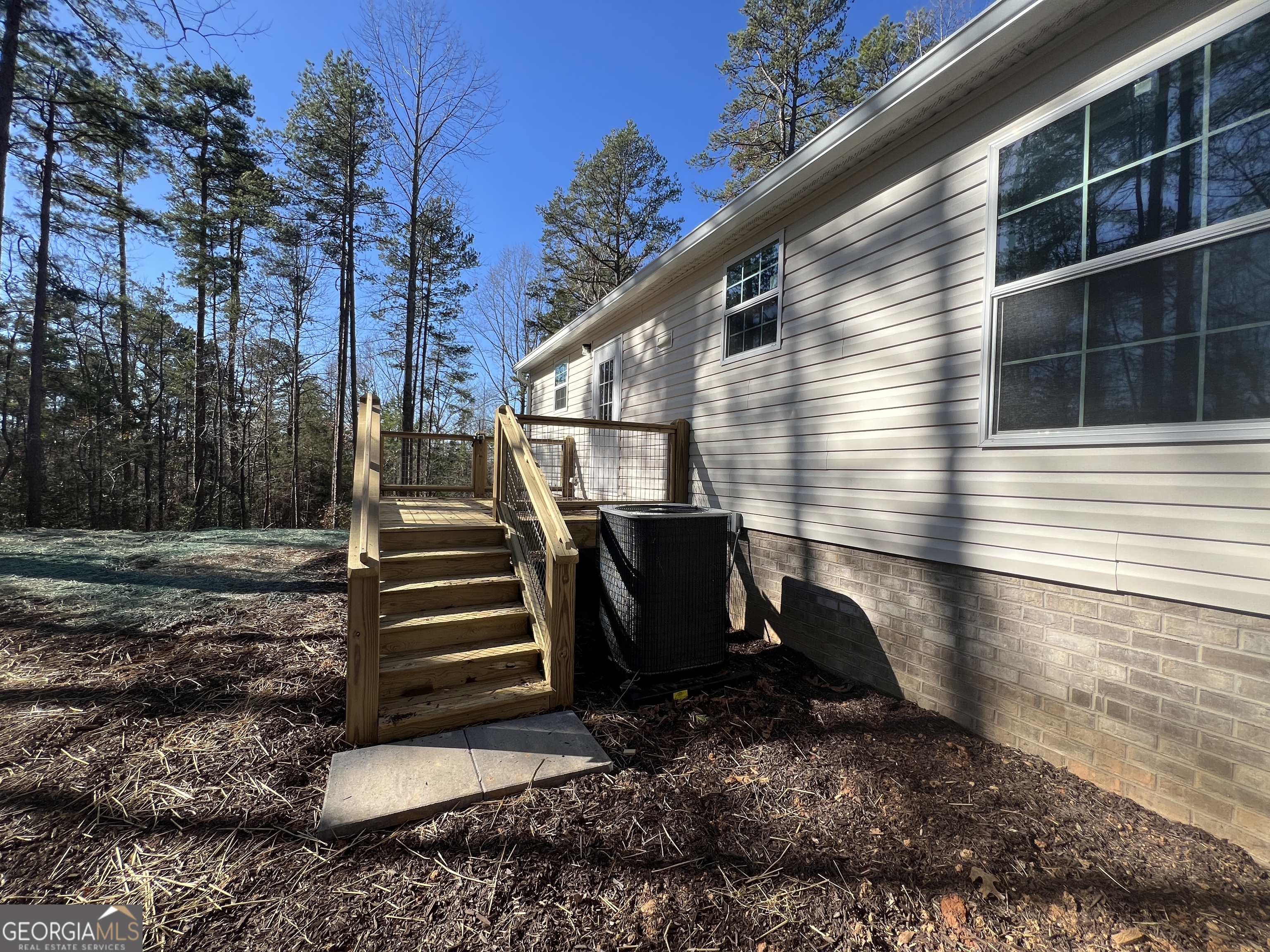 69 Cheyenne Trail Martin, GA 30557 - Photo 17 of 63 a view of a back yard with a patio