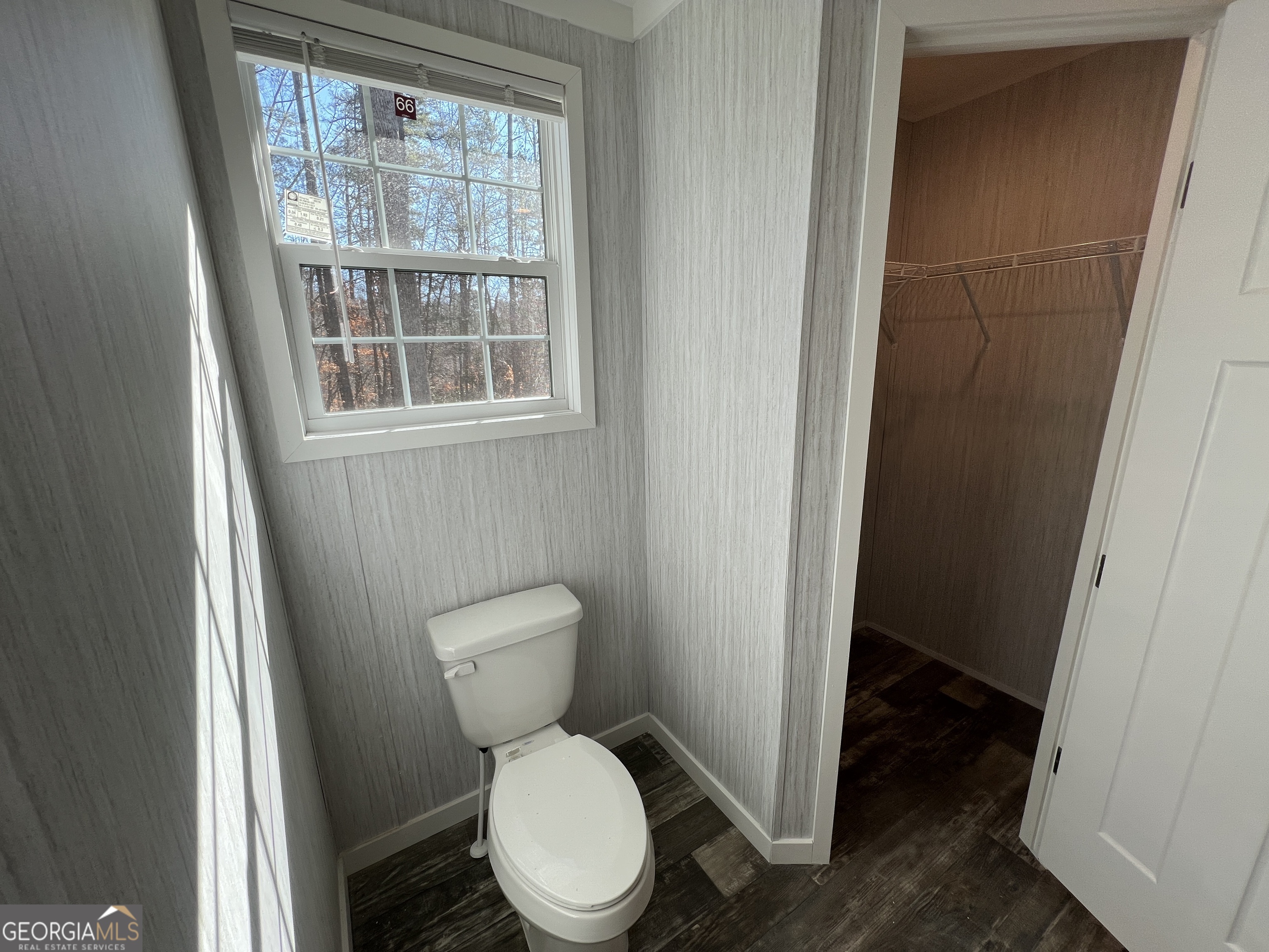 69 Cheyenne Trail Martin, GA 30557 - Photo 40 of 63 a white toilet sitting next to a window