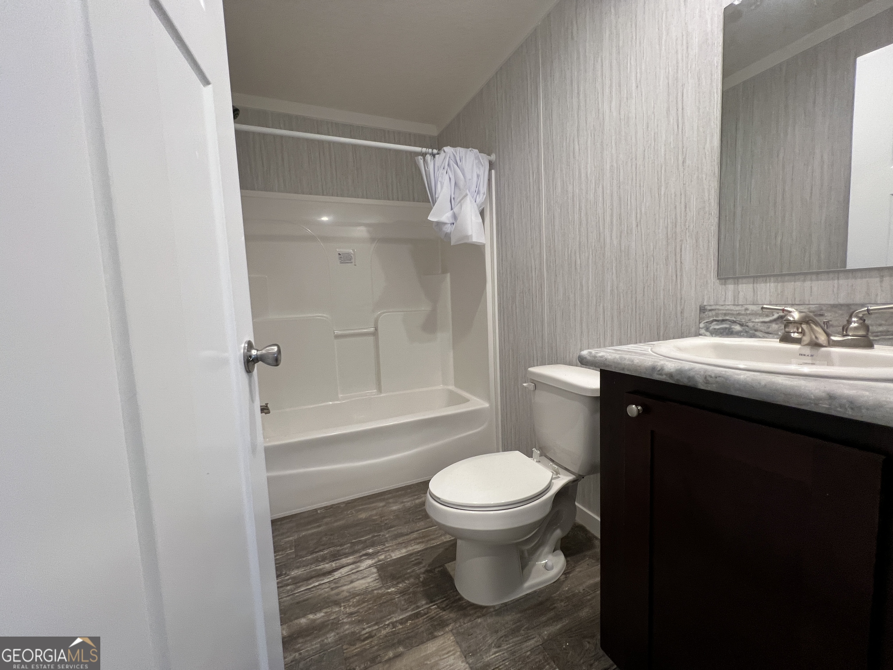 69 Cheyenne Trail Martin, GA 30557 - Photo 44 of 63 a bathroom with a sink toilet and shower
