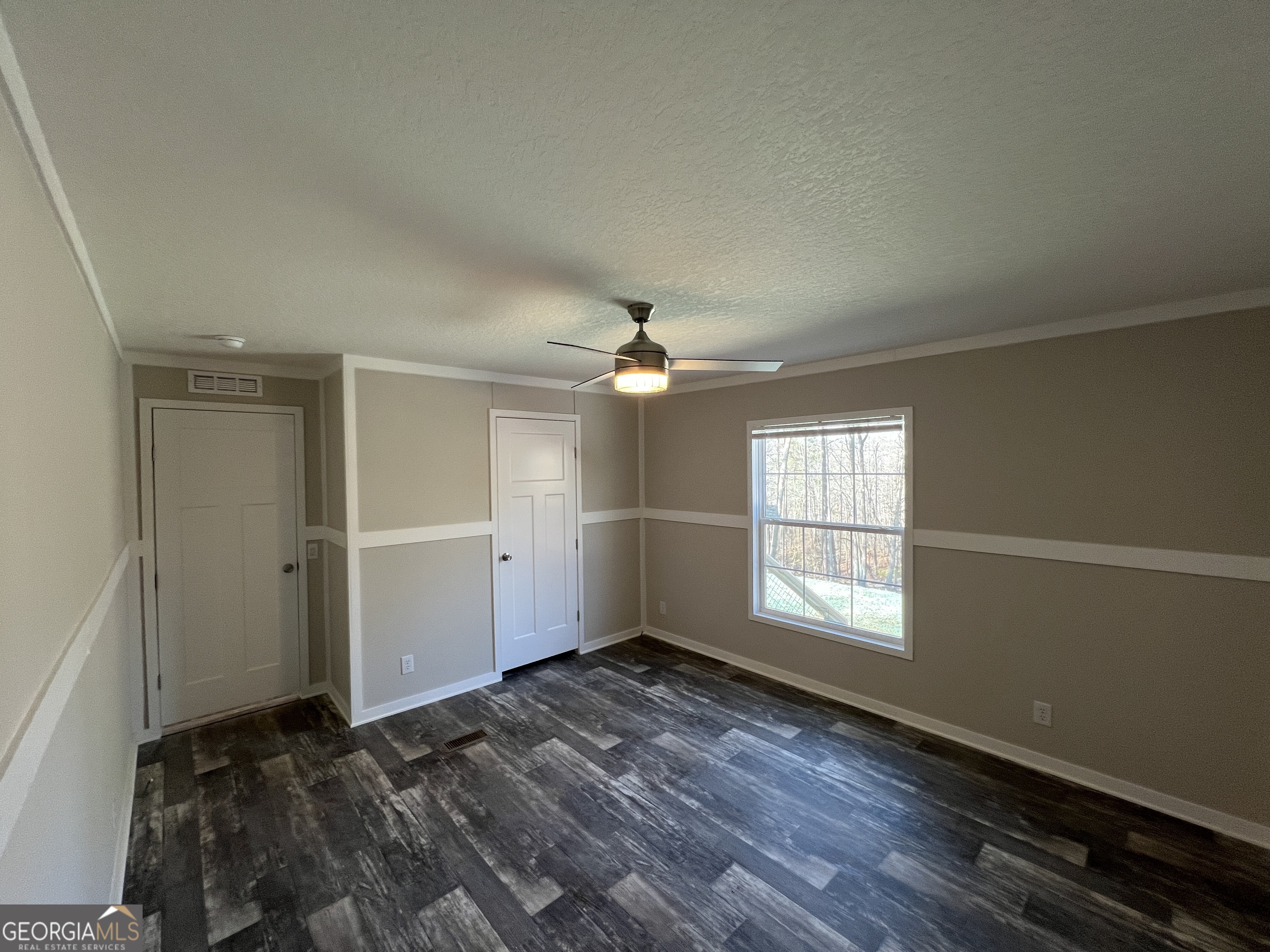 69 Cheyenne Trail Martin, GA 30557 - Photo 48 of 63 wooden floor in an empty room with a window