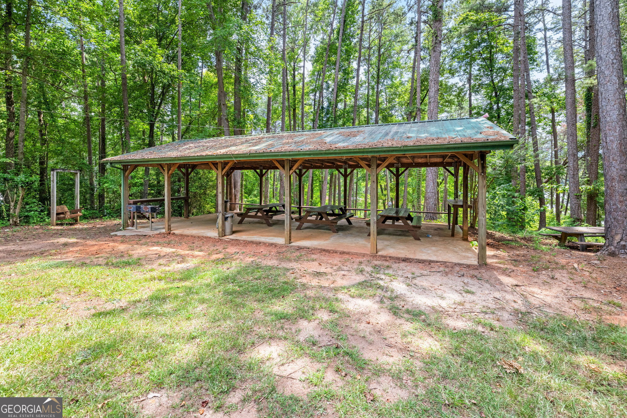 69 Cheyenne Trail Martin, GA 30557 - Photo 62 of 63 a backyard of a house with yard barbeque oven and outdoor seating
