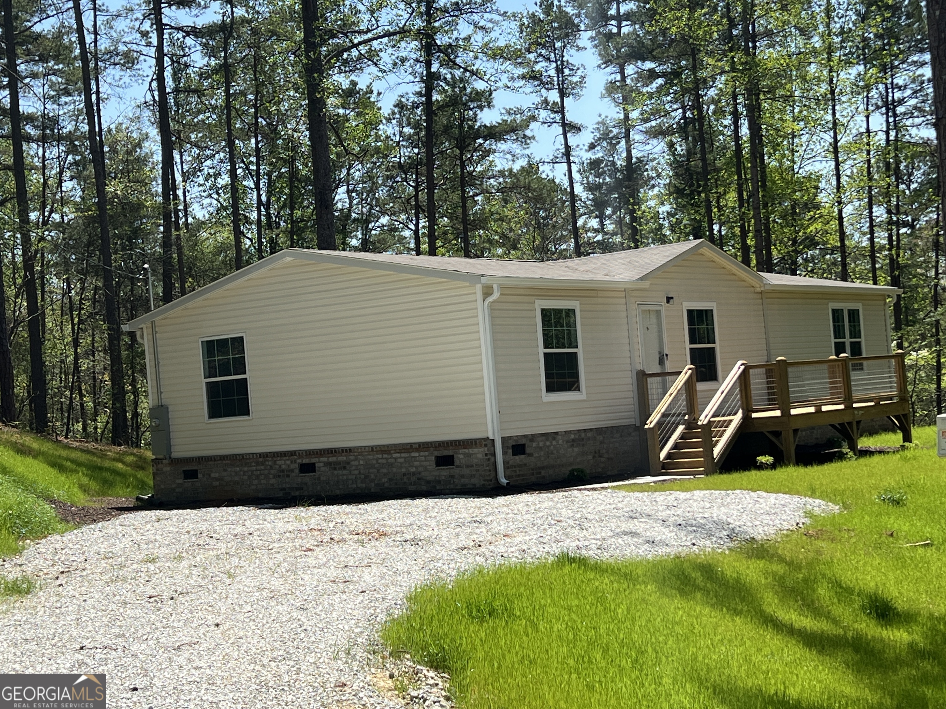 69 Cheyenne Trail Martin, GA 30557 - Photo 10 of 63 a front view of a house with a yard