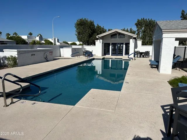 a view of a house with outdoor kitchen