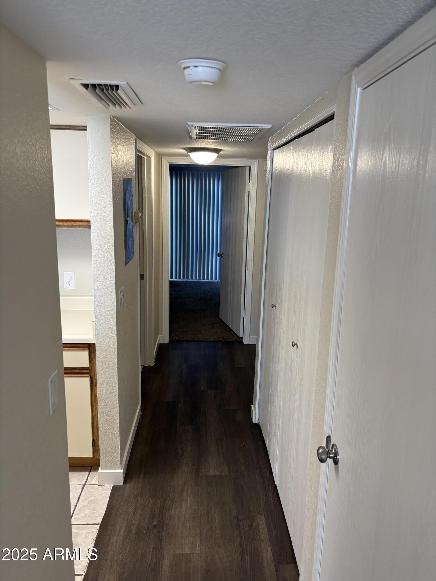 1444 North Recker Road, Unit 118 Mesa, AZ 85205 - Photo 6 of 22 a view of gallery with hallway