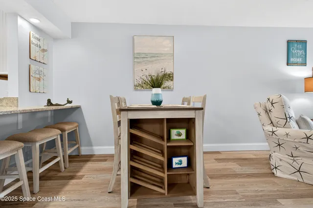 a living room with fireplace furniture and a flat screen tv