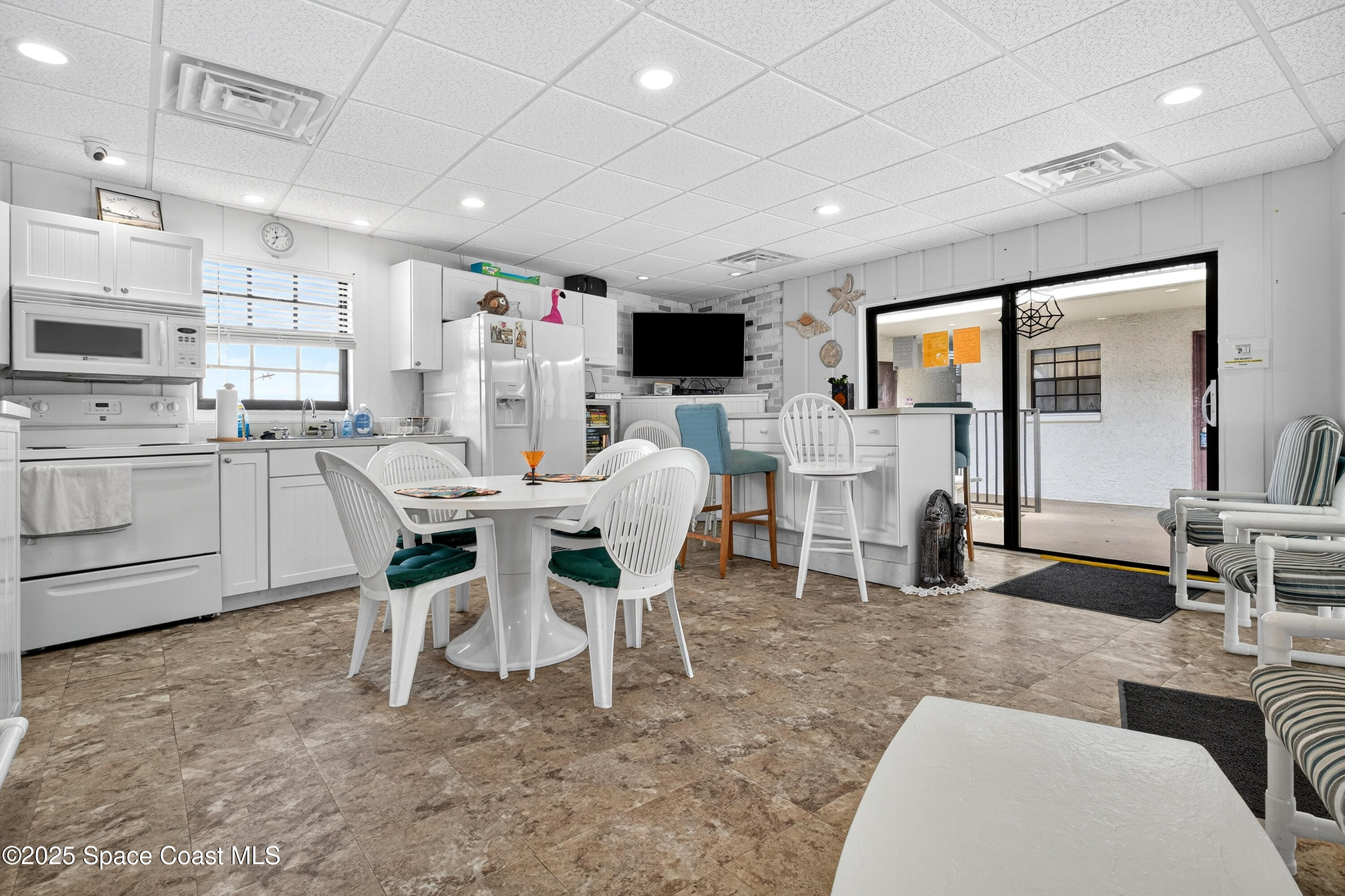 383 North Atlantic Avenue, Unit 105 Cocoa Beach, FL 32931 - Photo 44 of 67 a view of kitchen with breakfast area
