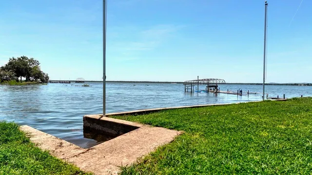 a view of a lake from a yard