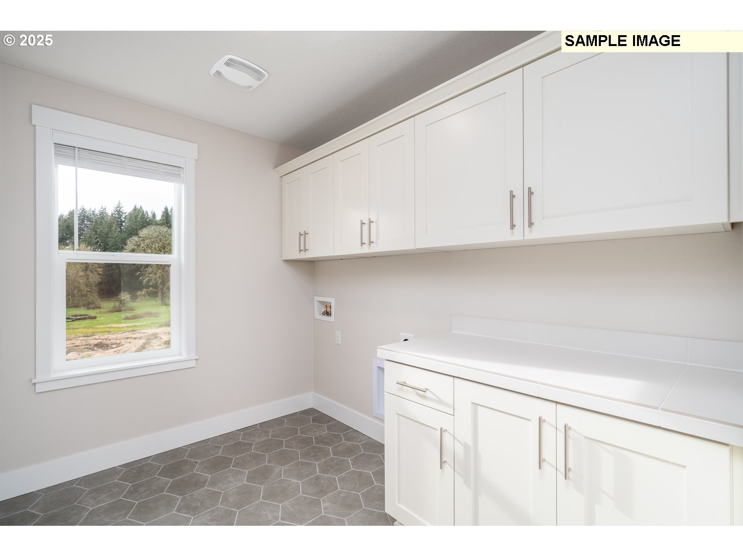 9017 North 5th Street, Unit 238 Ridgefield, WA 98642 - Photo 21 of 26 a kitchen with a white cabinets and window