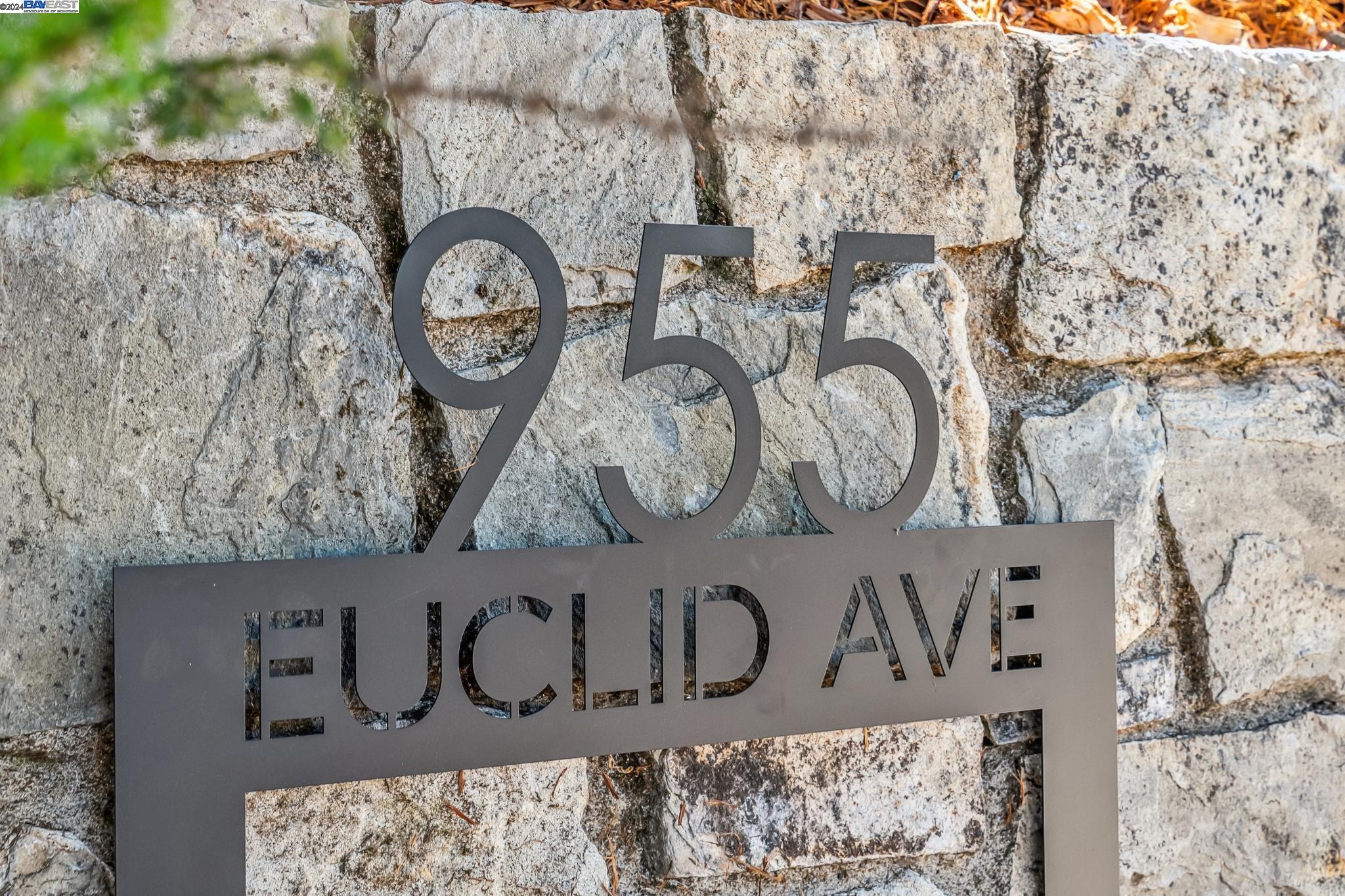 a view of a sign board with a wall