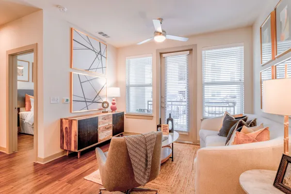 a living room with furniture and a window
