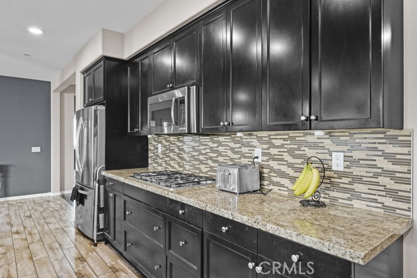 23347 Crystal Way Wildomar, CA 92595 - Photo 22 of 109 Granite and Tile Kitchen with Stainless