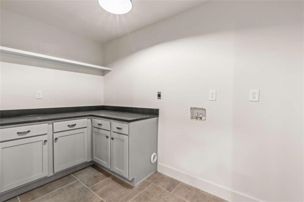 7448 Berea Road Winston, GA 30187 - Photo 21 of 43 a kitchen with a sink and cabinets