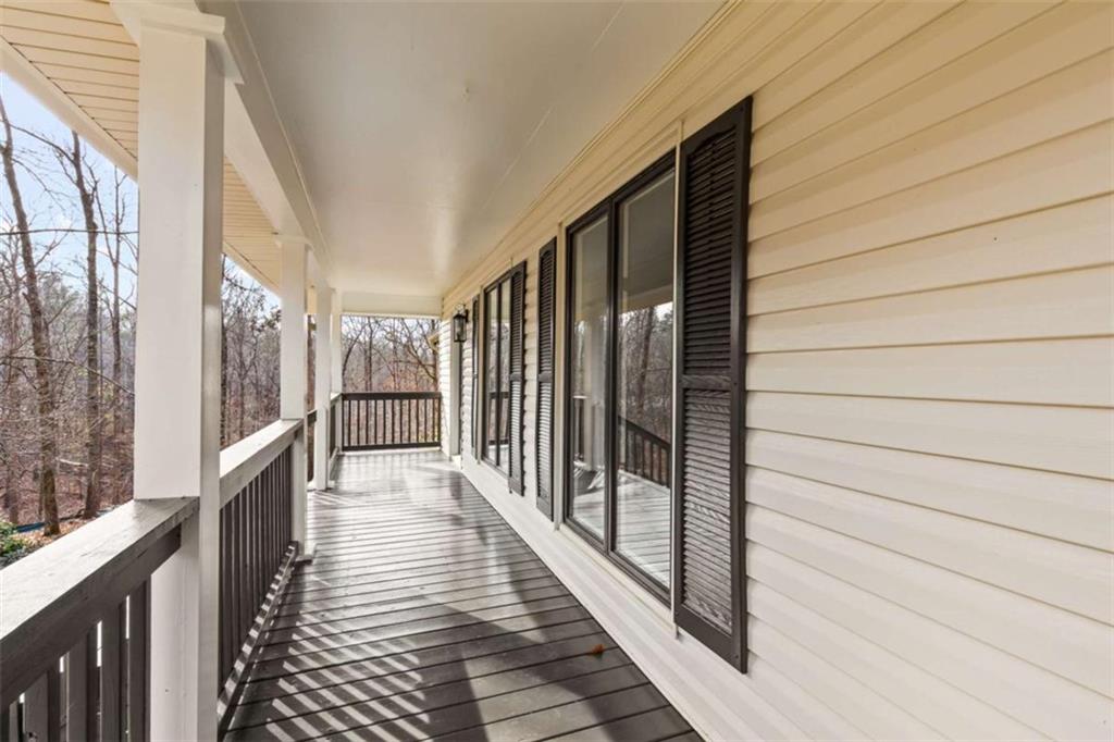 7448 Berea Road Winston, GA 30187 - Photo 10 of 43 a view of a balcony with wooden floor