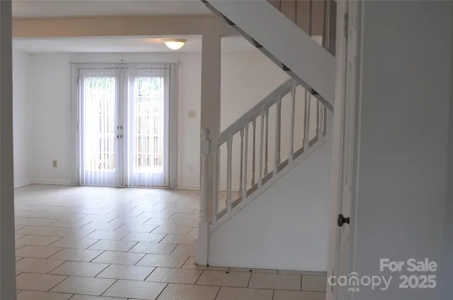 a view of a hallway with entryway