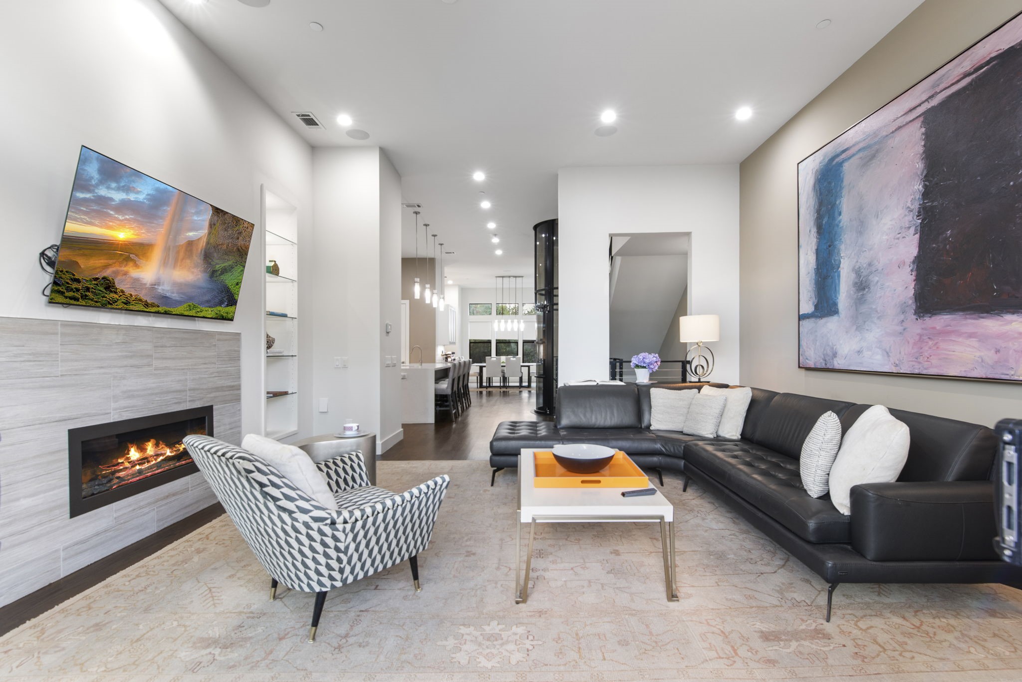 205 Portland Street Houston, TX 77006 - Photo 15 of 36 a living room with furniture and a fireplace