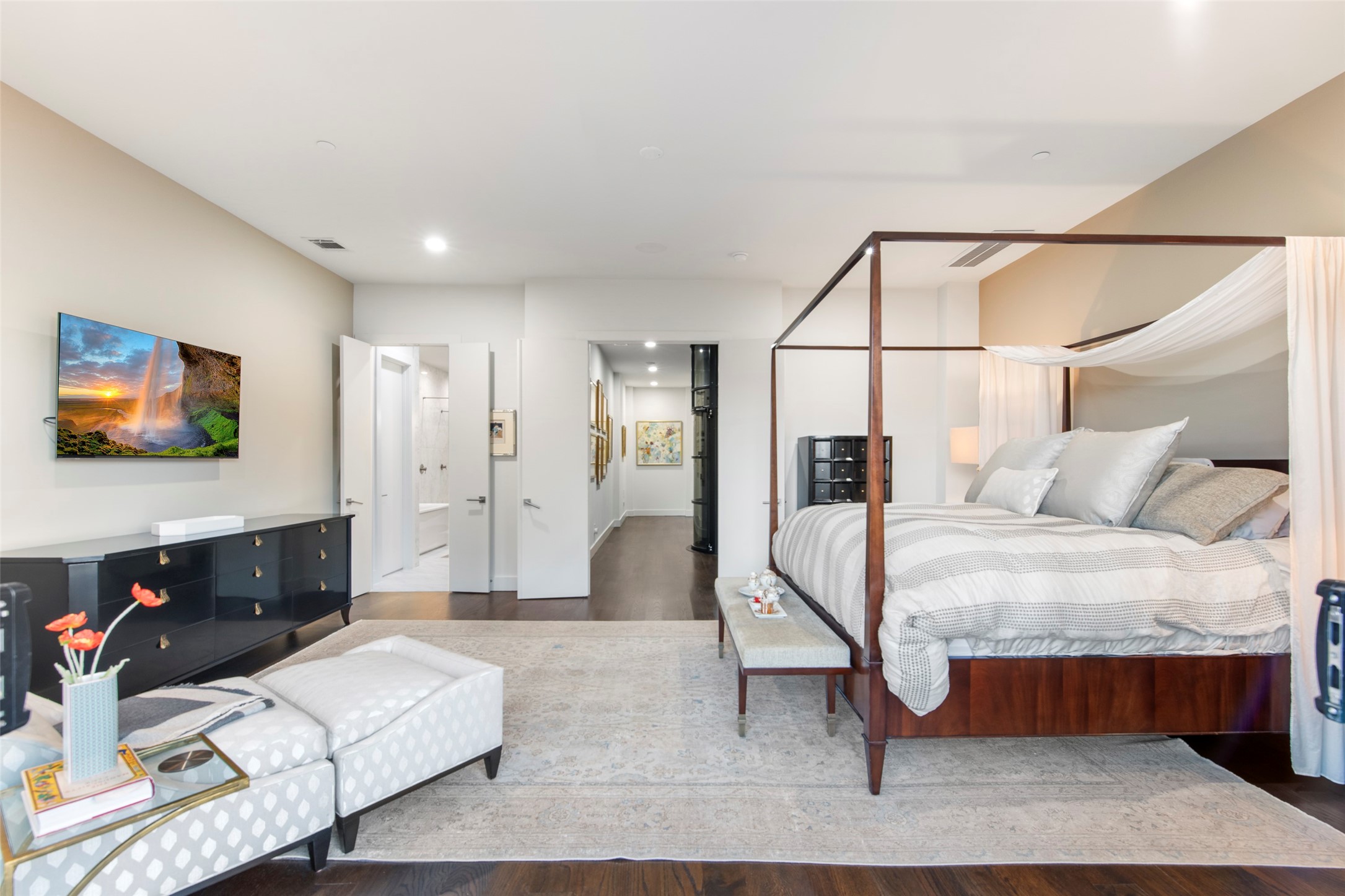 205 Portland Street Houston, TX 77006 - Photo 20 of 36 a living room with furniture a rug and a flat screen tv