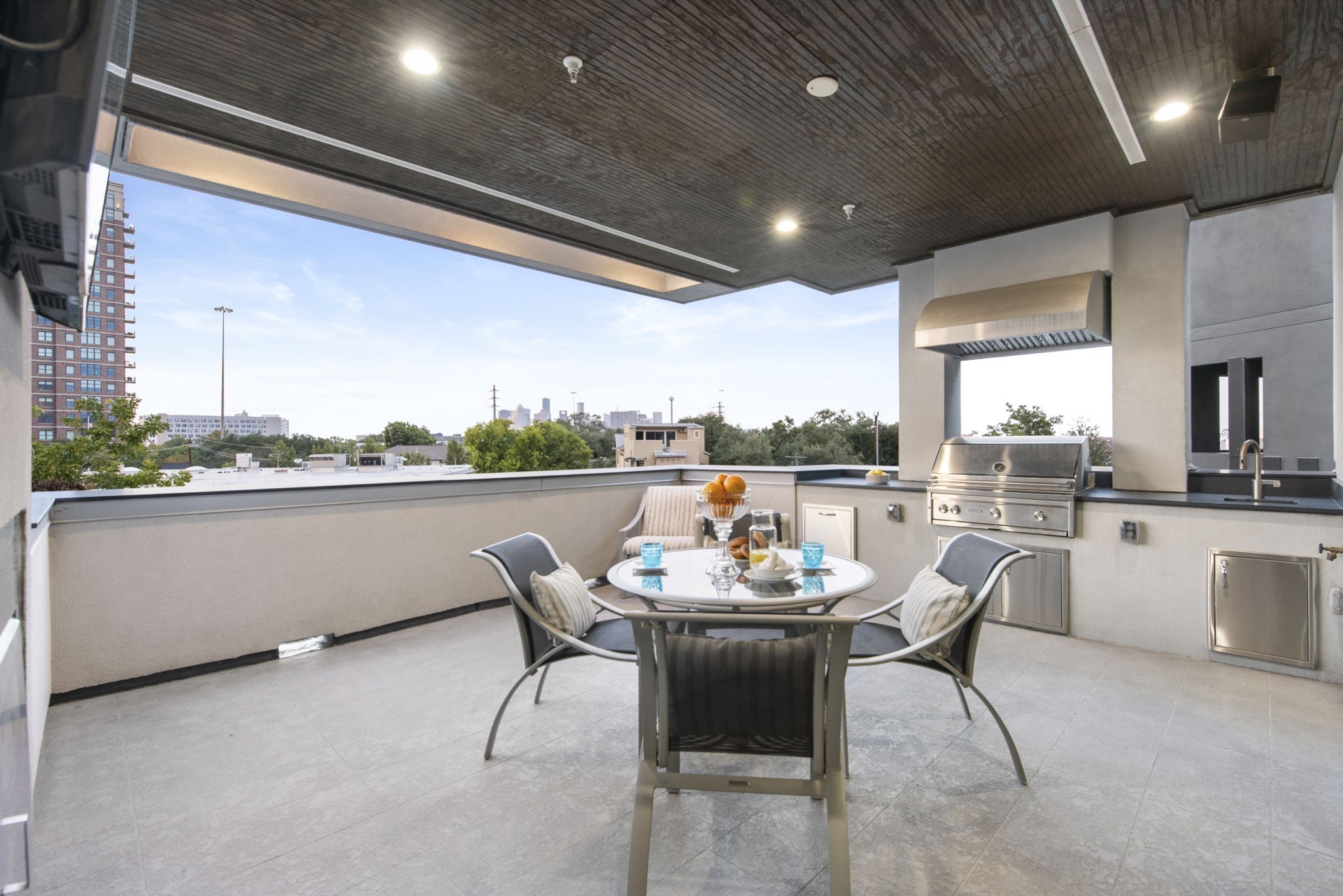 205 Portland Street Houston, TX 77006 - Photo 27 of 36 a view of a dining room with furniture window and outside view