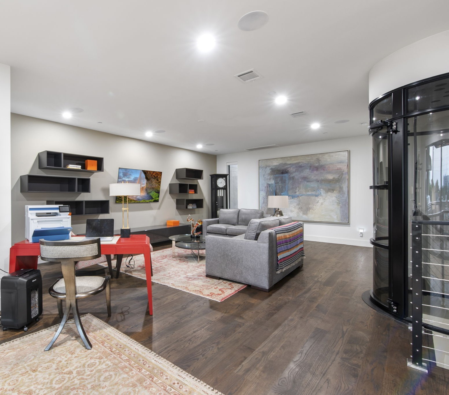 205 Portland Street Houston, TX 77006 - Photo 28 of 36 a living room with furniture and a wooden floor