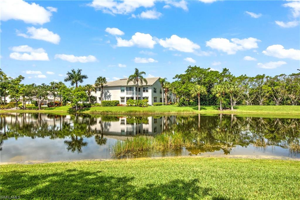 8385 Whisper Trace Way, Unit N104 Naples, FL 34114 - Photo 14 of 16 a view of a lake