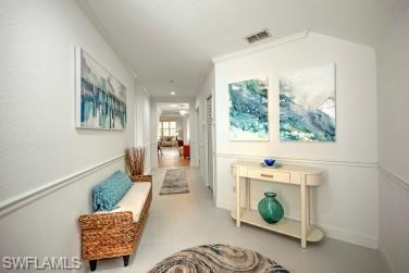 8385 Whisper Trace Way, Unit N104 Naples, FL 34114 - Photo 4 of 16 a living room with furniture and a window