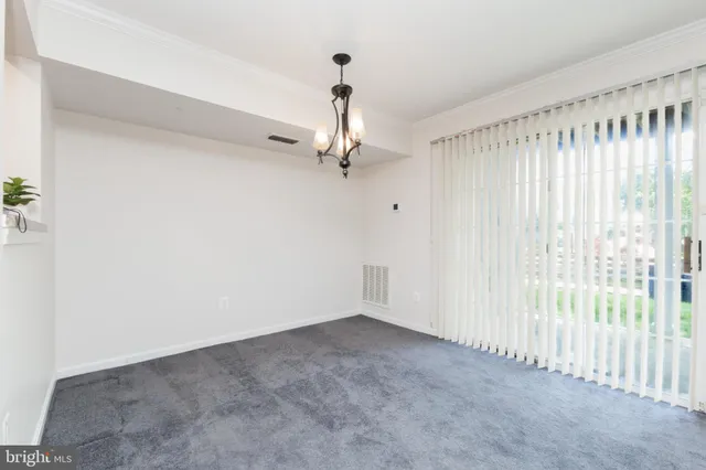 a view of a chandelier in a room