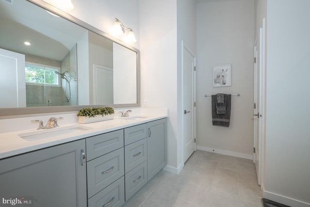 a view of an empty room with stairs