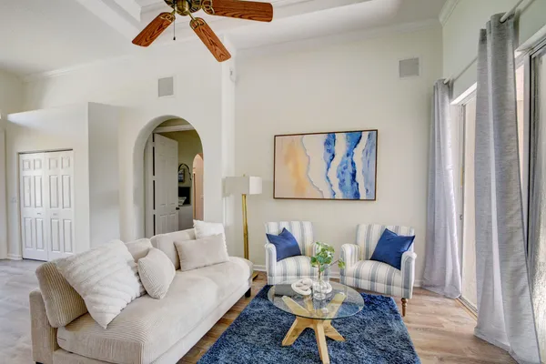 a living room with furniture and a window