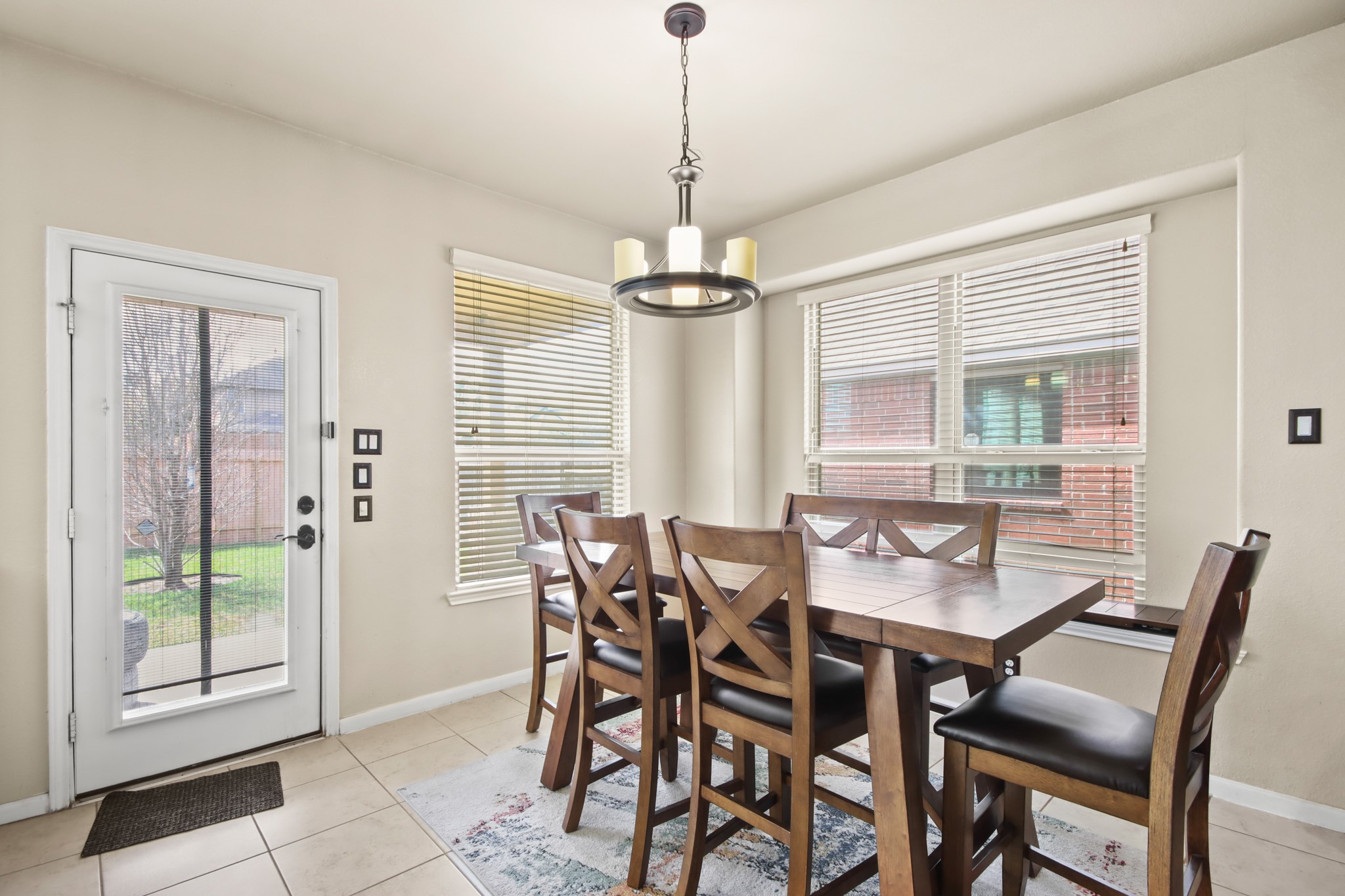 25407 Terrain Park Drive Spring, TX 77373 - Photo 12 of 33 a dining room with furniture and window
