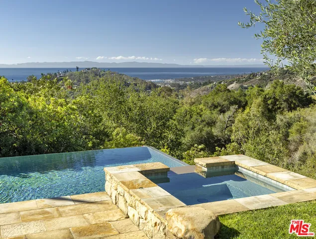 a view of yard with swimming pool