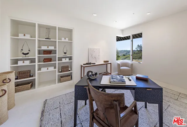 a living room with furniture and furniture