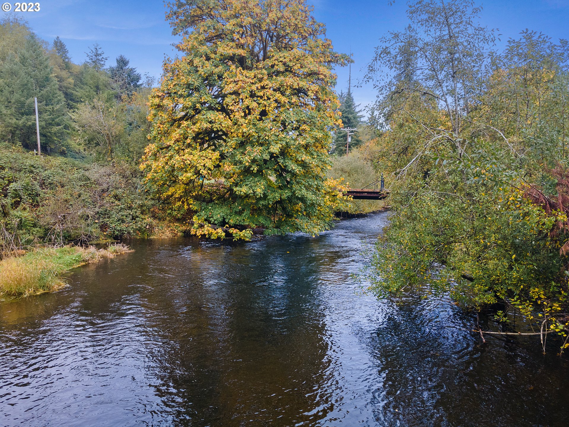 701 Highway 101 South Cloverdale, OR 97112 - Photo 7 of 12 a view of a lake with a yard