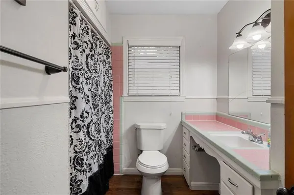 a room with furniture and a wooden floor