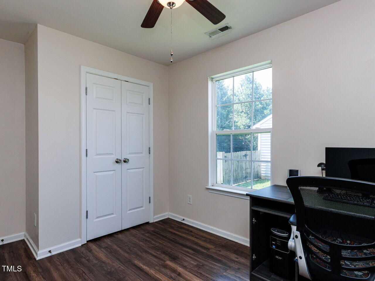 3665 Watkins Ridge Court Raleigh, NC 27616 - Photo 21 of 28 a view of a workspace with furniture and a window