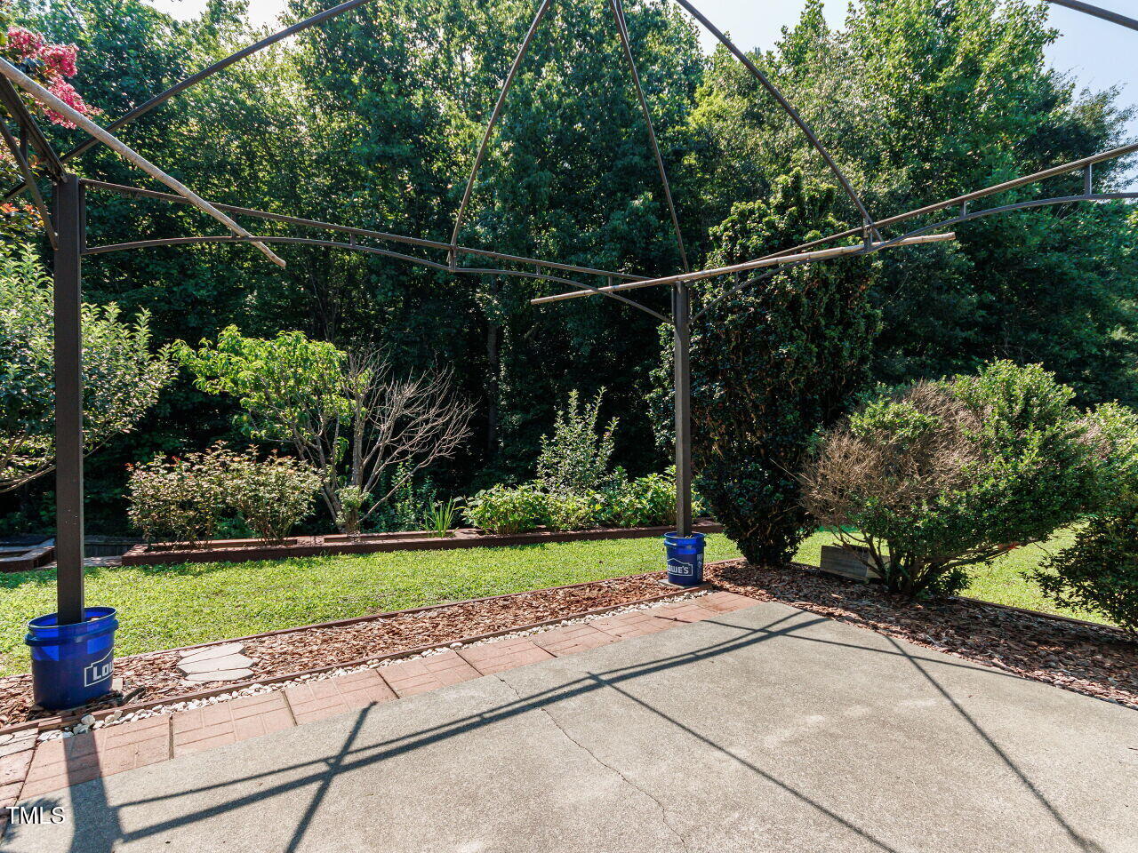 3665 Watkins Ridge Court Raleigh, NC 27616 - Photo 23 of 28 a garden view with a seating space