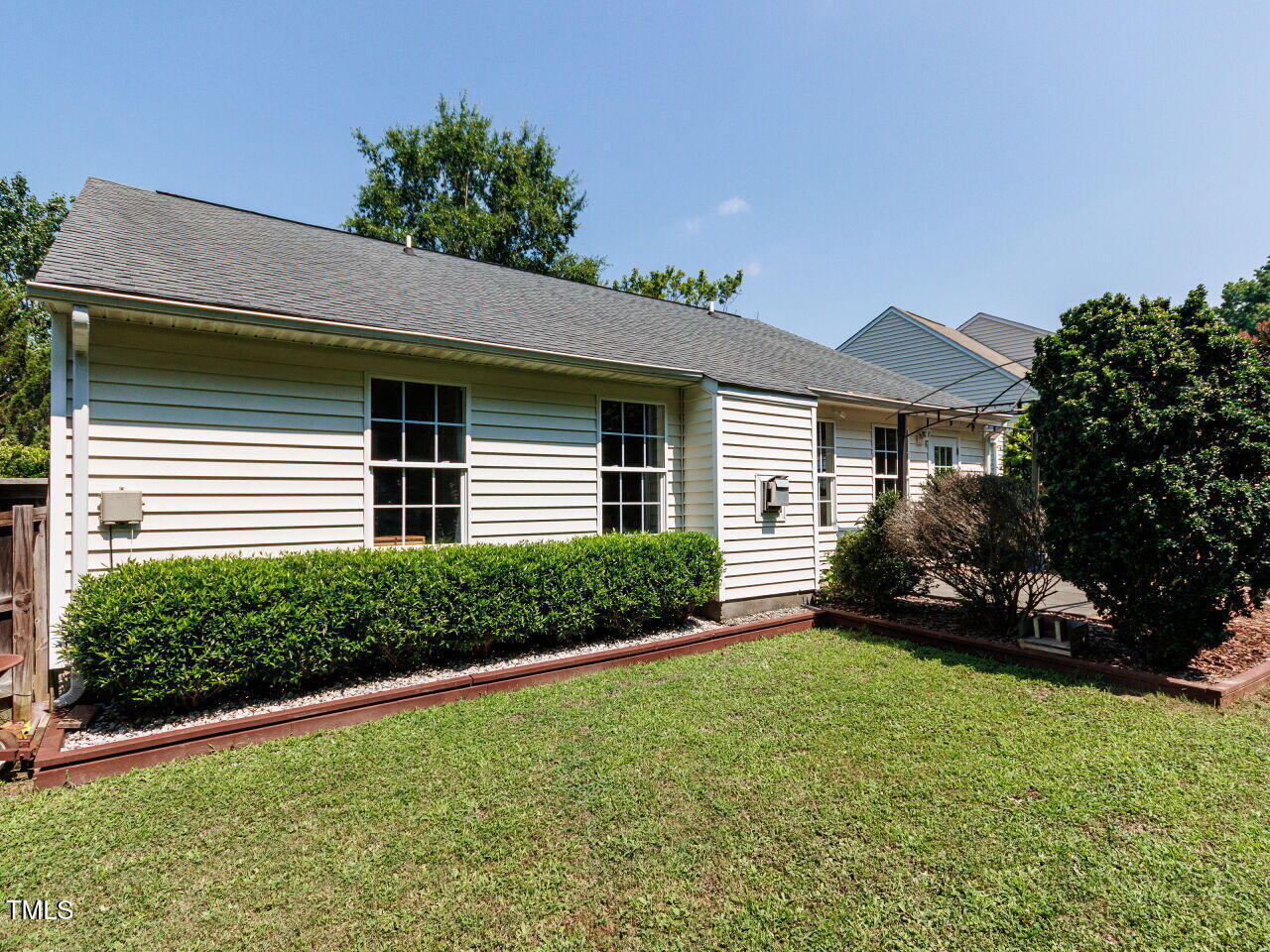 3665 Watkins Ridge Court Raleigh, NC 27616 - Photo 26 of 28 a front view of a house with a yard and garage