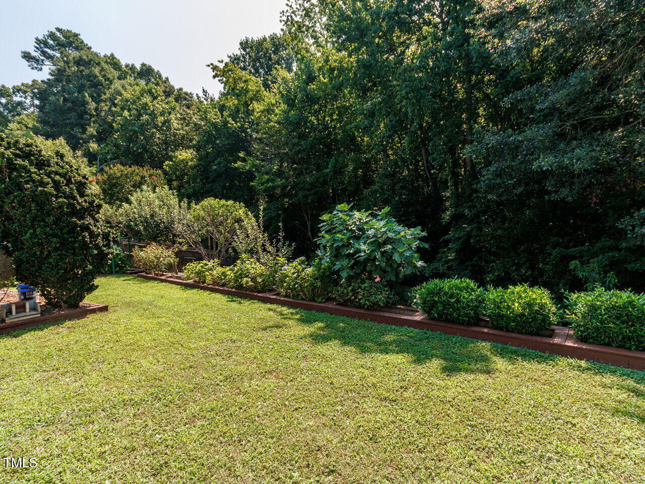 3665 Watkins Ridge Court Raleigh, NC 27616 - Photo 27 of 28 a view of a swimming pool with a yard