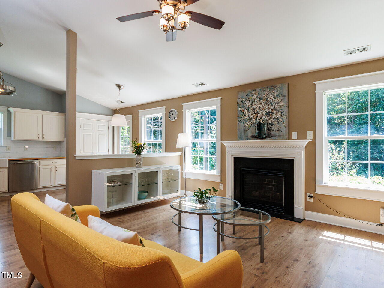 3665 Watkins Ridge Court Raleigh, NC 27616 - Photo 5 of 28 a living room with furniture and a fireplace