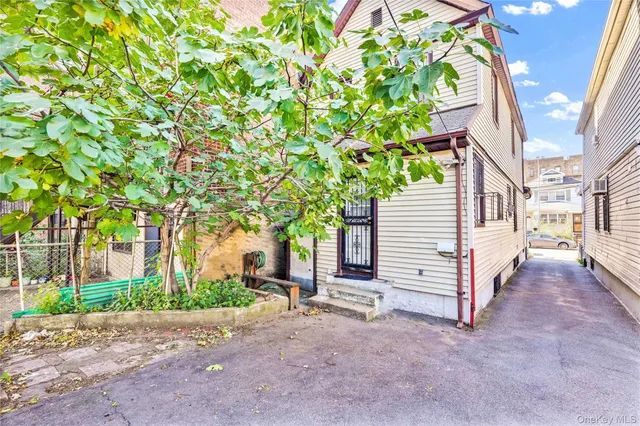 a view of a house with a street