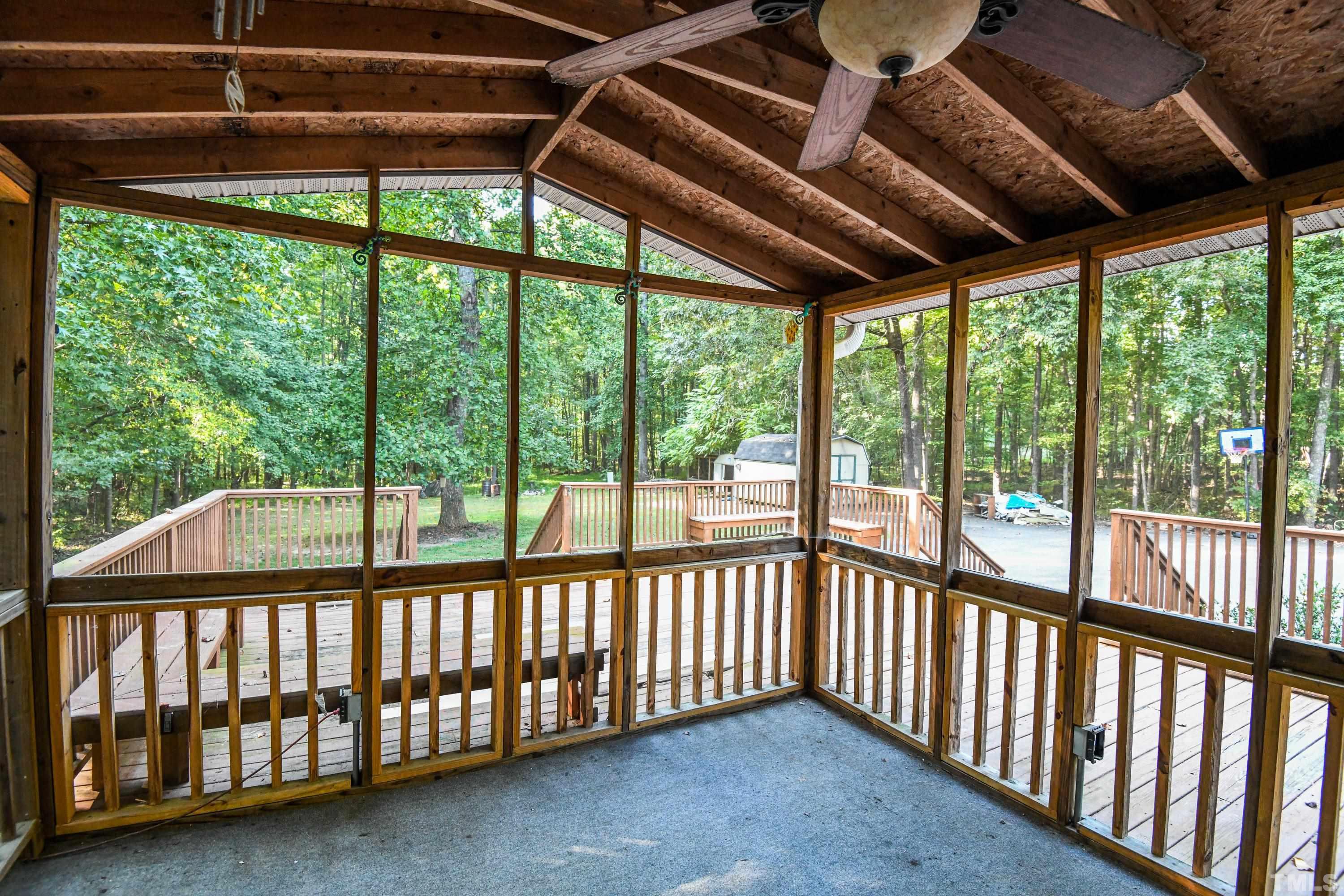 1516 Bill Poole Road Rougemont, NC 27572 - Photo 13 of 17 a view of a porch