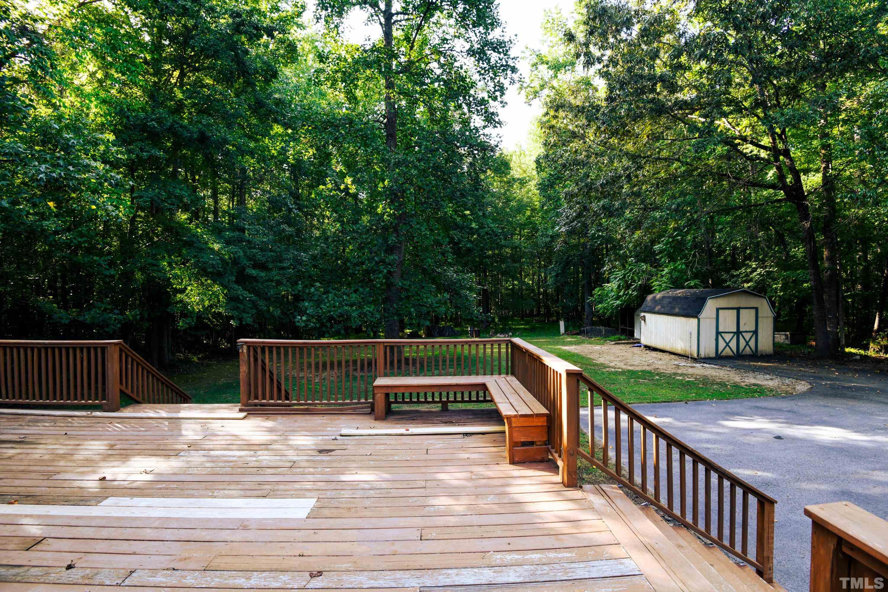 1516 Bill Poole Road Rougemont, NC 27572 - Photo 14 of 17 a view of a swimming pool with a deck